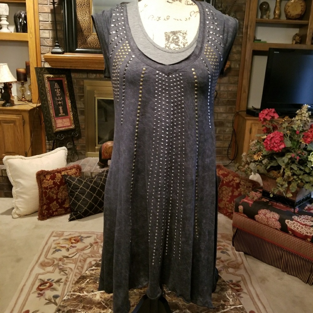A long medal studded long two piece shirt or dress